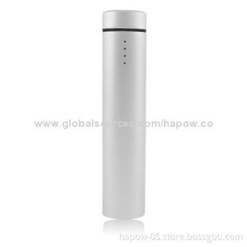 Travel charger with mini speaker and phone holder